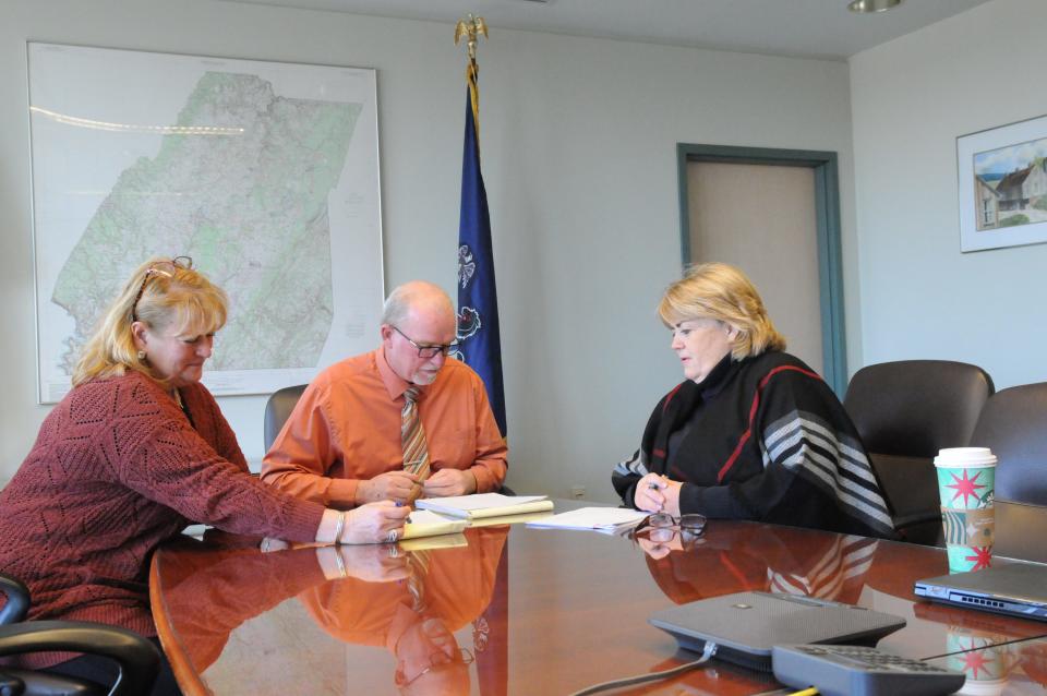 The Somerset County Commissioners, from left, Colleen Dawson, Gerald Walker and Pam Tokar-Ickes, go over their spending plan for 2023 before a media review.