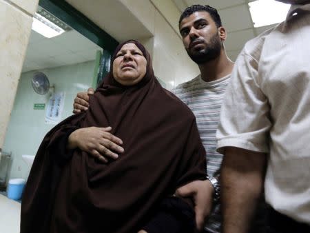 Relatives of missing persons from a capsized boat in the Mediterranean Sea are pictured in Al-Beheira, Egypt, September 22, 2016. REUTERS/Mohamed Abd El Ghany