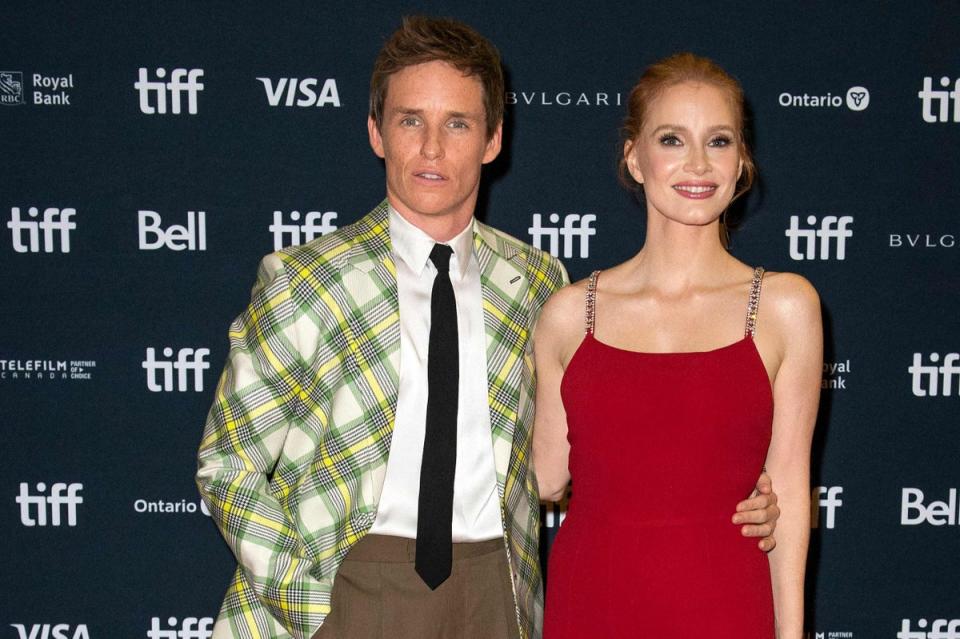 British actor Eddie Redmayne (L) and US actress Jessica Chastain arrive for the premiere of 