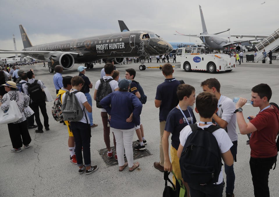 An Embraer Profit Hunter E195-E2 rolls on the tarmac at Paris Air Show, in Le Bourget, east of Paris, France, Tuesday, June 18, 2019. The world's aviation elite are gathering at the Paris Air Show with safety concerns on many minds after two crashes of the popular Boeing 737 Max. (AP Photo/Michel Euler)