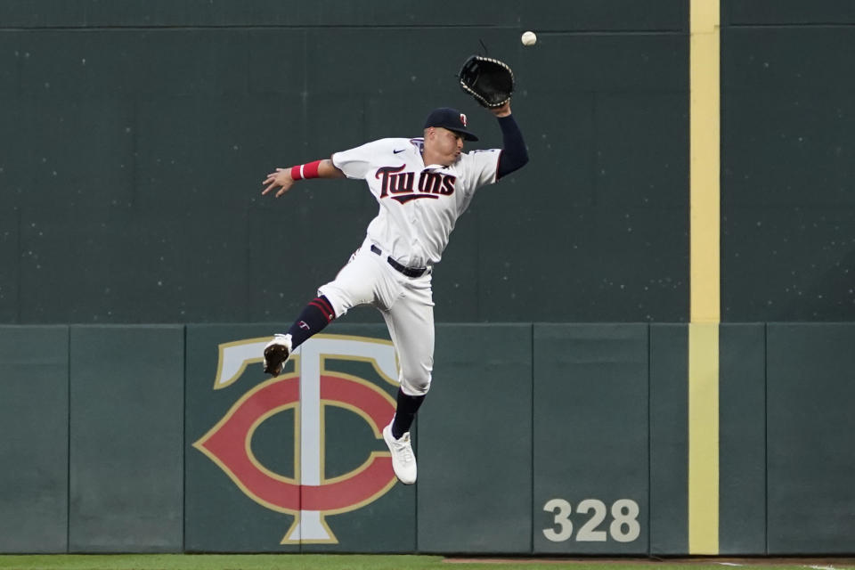 Minnesota Twins first baseman Jose Miranda is unable to make the play on an RBI double by Detroit Tigers' Riley Greene during the fifth inning of a baseball game Tuesday, Aug. 2, 2022, in Minneapolis. (AP Photo/Abbie Parr)
