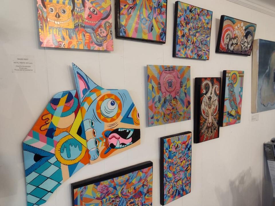 A selection of available works at Sulfur Studios, located at 2301 Bull St., including paintings by Maxx Feist.