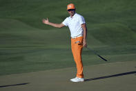 Rickie Fowler reacts after his putt on the 15th green during the final round of the CJ Cup golf tournament Sunday, Oct. 17, 2021, in Las Vegas. (AP Photo/David Becker)