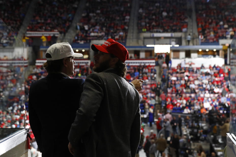 Attendees look for seats before a campaign rally for President Donald Trump, Friday, Feb. 28, 2020, in North Charleston, S.C. (AP Photo/Patrick Semansky)