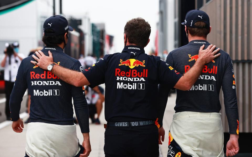  Red Bull Racing Team Principal Christian Horner talks with Max Verstappen of Netherlands and Red Bull Racing and Sergio Perez of Mexico and Red Bull Racing in the Paddock before the F1 Grand Prix of Hungary at Hungaroring on August 01, 2021 in Budapest, Hungary - Getty Images Europe 