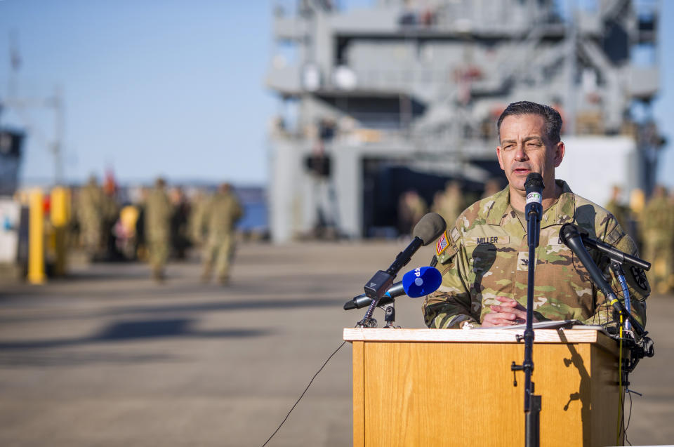 Col. Sam Miller, commander of 7th Transportation Brigade (Expeditionary), speaks to media before units from his brigade deploy to Gaza in support of a humanitarian mission on Tuesday, March 12, 2024, at Joint Base Langley-Eustis in Hampton, Va. (AP Photo/John C. Clark)