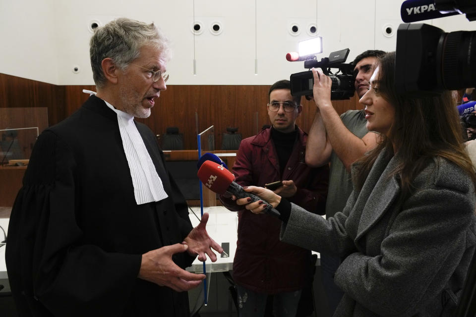 Gert-Jan van den Bergh, lawyer for Ukraine, reacts after the verdict in a Dutch appeals court in Amsterdam, Tuesday Oct. 26, 2021, on ownership of a trove of Crimean historical artifacts that were loaned to an Amsterdam museum shortly before Russia annexed the region. A lower court ruled in 2016 that the treasures should be handed to the Ukrainian government. (AP Photo/Peter Dejong)