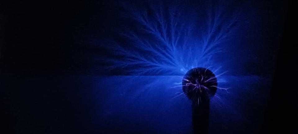 A Georgia Copper electric coil in blue laser type lights.