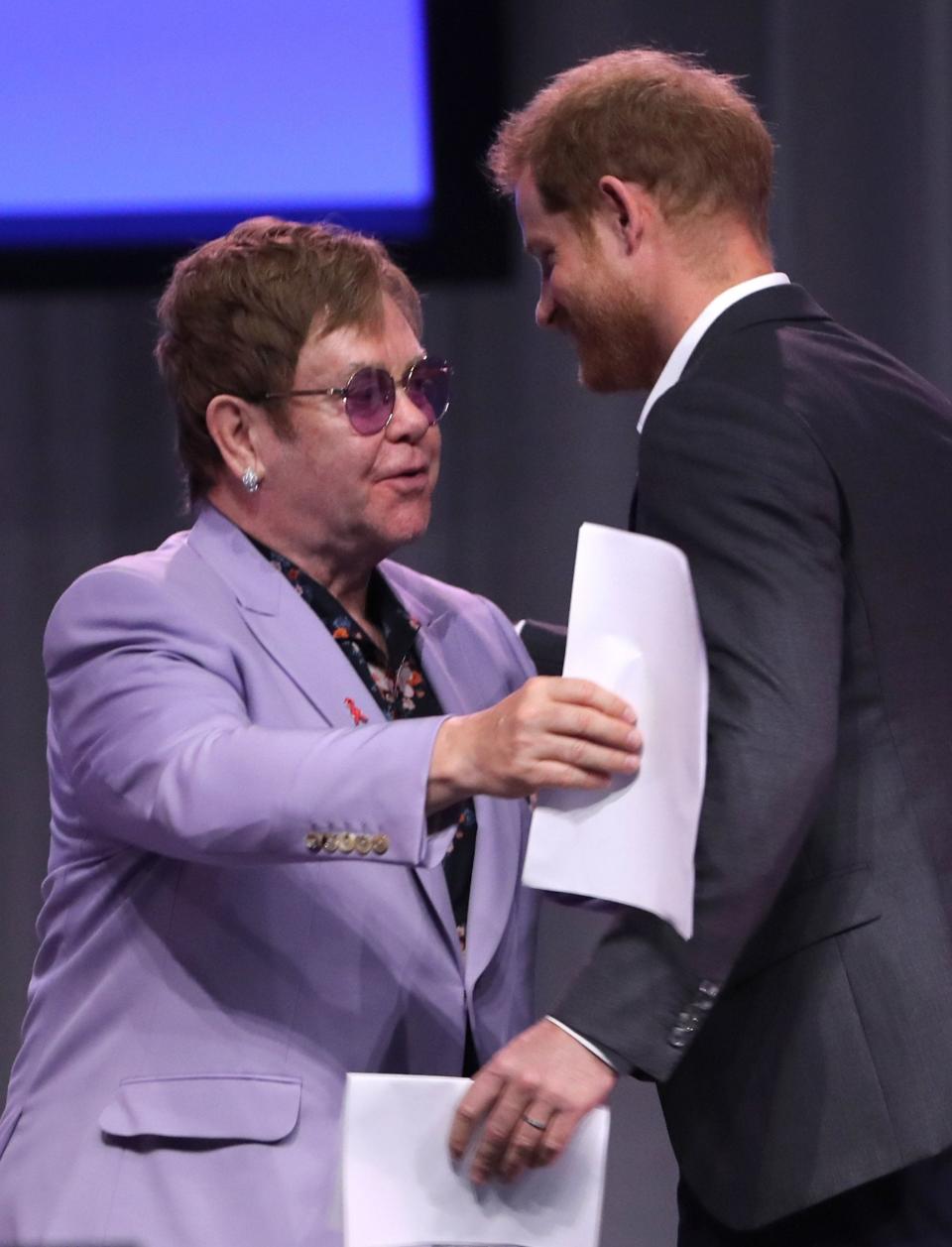 The Duke of Sussex reunited with Elton John, who performed for select guests at his wedding reception, on stage at the International Aids conference in Amsterdam (PA)