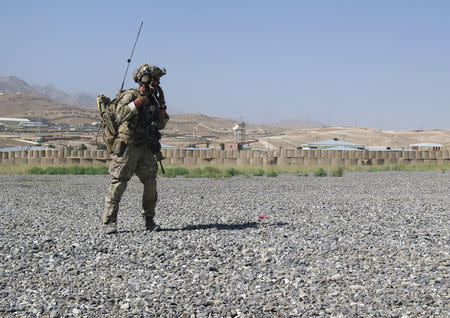 A U.S. military adviser from the 1st Security Force Assistance Brigade is sen at an Afghan National Army base in Maidan Wardak province, Afghanistan August 6, 2018. REUTERS/James Mackenzie