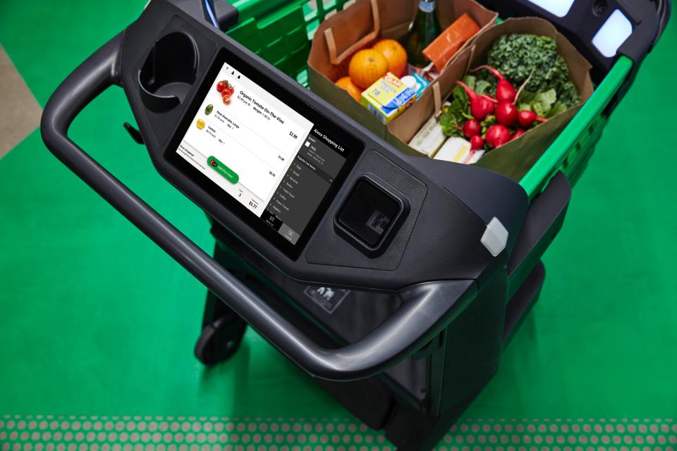 Amazon's Dash Cart lets customers at its new Fresh supermarket check out directly from the cart