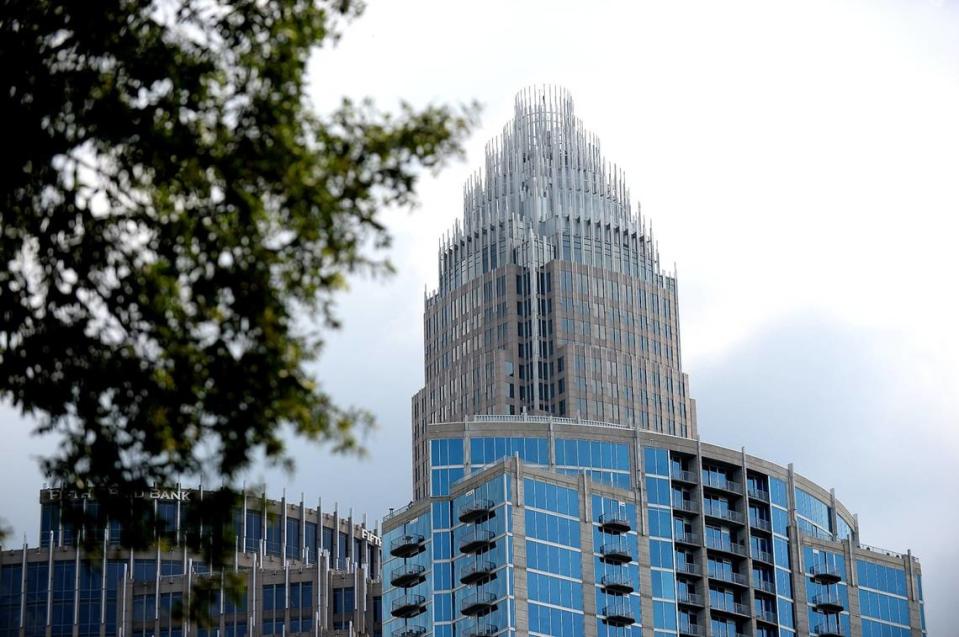 Bank of America is relocating employees from two uptown buildings to other nearby locations in Charlotte The Bank of America Corporate Center, seen here, is not impacted by the moves.