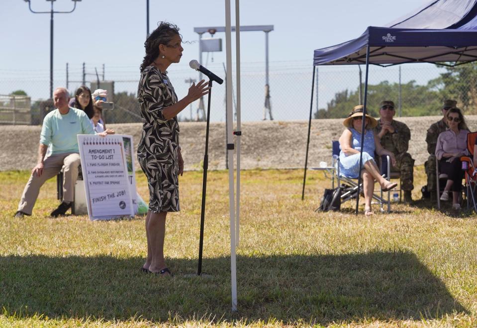 Jacqui Thurlow-Lippisch, with South Florida Water Management District, speaks during the Rivers Coalition "Rally at the Locks, Stop the Discharges" meeting at the St. Lucie Lock and Dam in Martin County on Thursday, March, 23, 2023. The rally was held to protest the 10 billion-plus-gallons of discharges into the St. Lucie River this year. "I can tell you that as hard things are, we have and are making tremendous progress," said Thurlow-Lippisch. "Most of that progress is because of the Army Corps of Engineers." Speakers included, Brig. Gen. Daniel Hibner, with the South Atlantic District Command of the U.S. Army Corps of Engineers, Martin County commissioners, Stuart city commissioners, state officials and environmental nonprofits. Martin County residents also came out with posters in protest of the discharges.