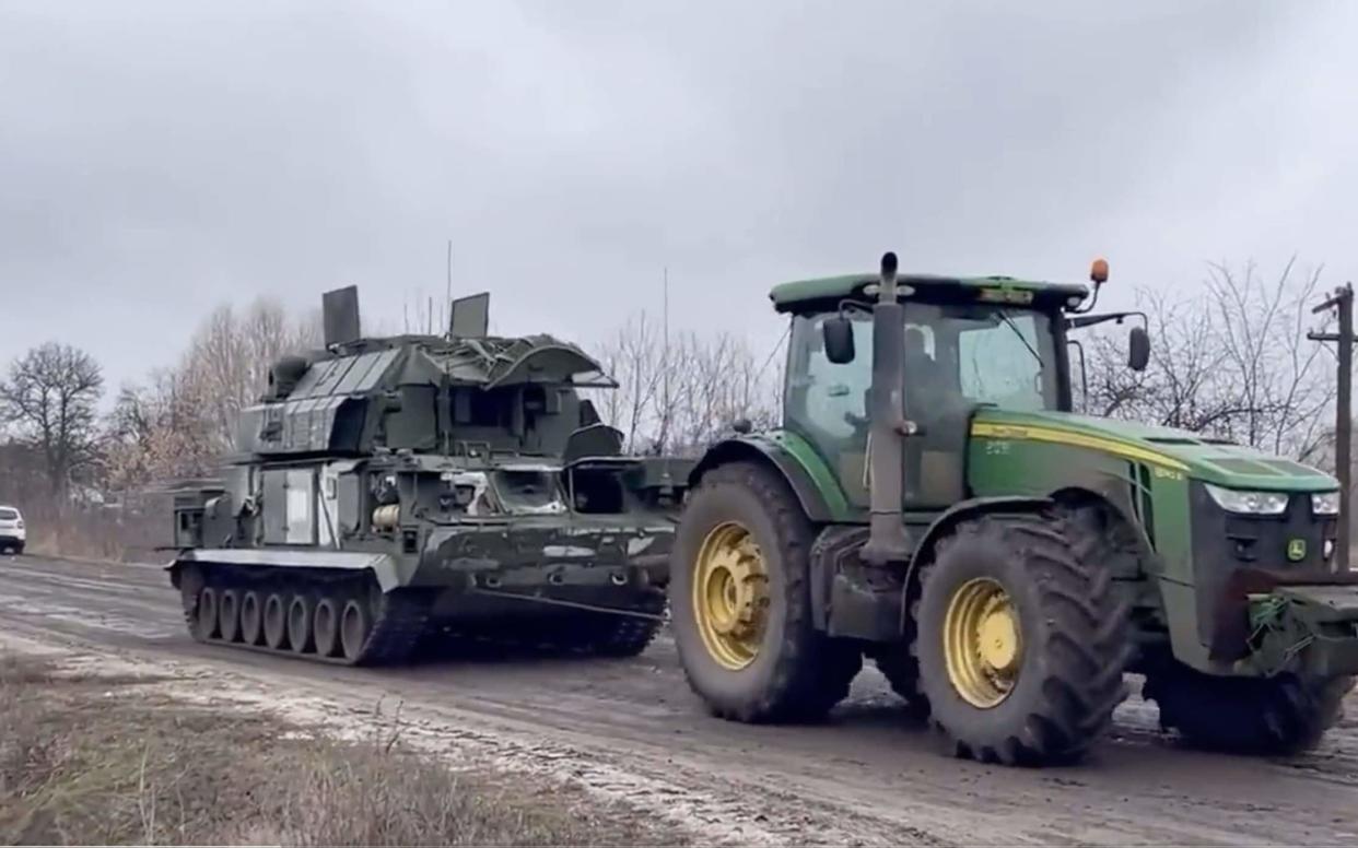 Videos of tractors tugging a range of “confiscated” Russian military equipment have gone viral
