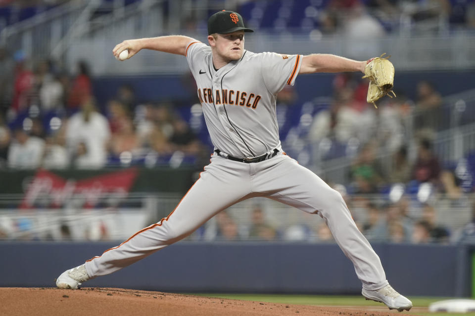 San Francisco Giants starting pitcher Logan Webb (62) throws a pitch during the first inning of a baseball game against the Miami Marlins, Saturday, June 4, 2022, in Miami. (AP Photo/Marta Lavandier)