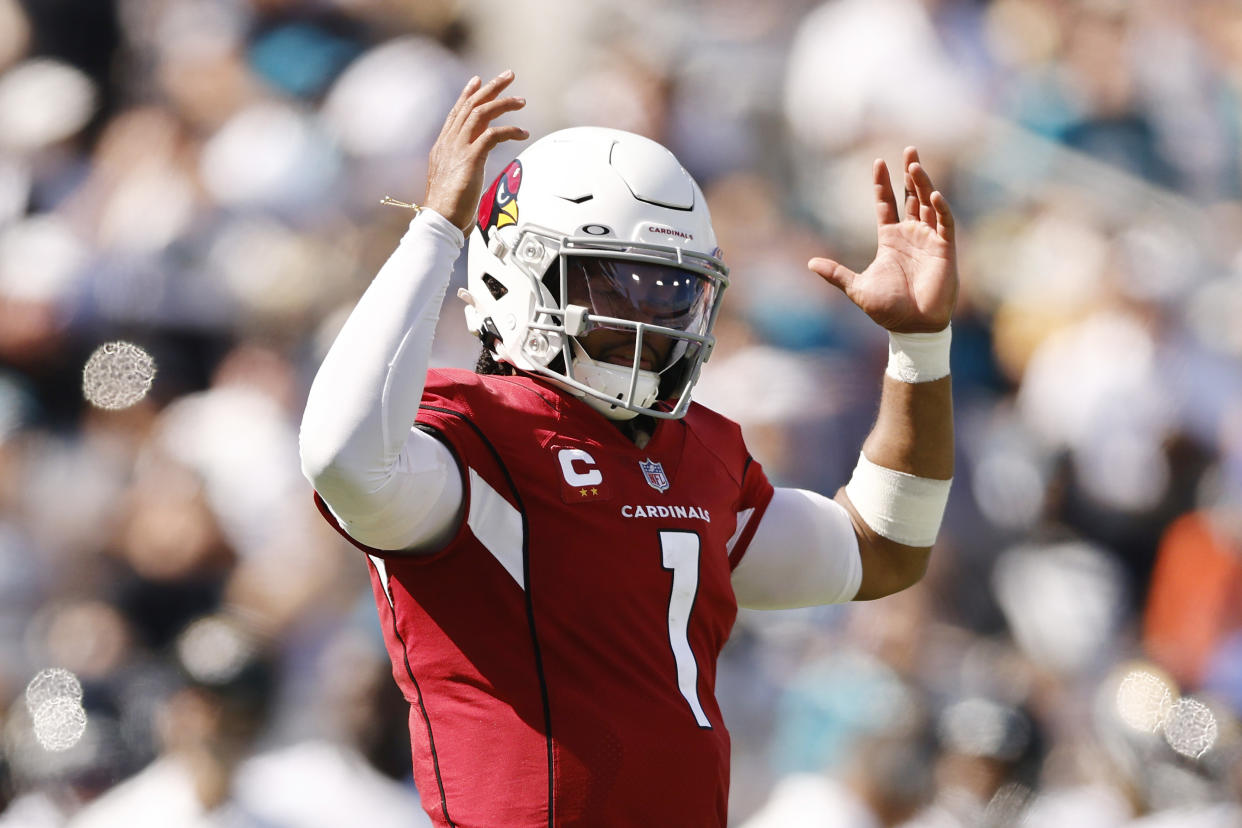 JACKSONVILLE, FLORIDA - SEPTEMBER 26: Kyler Murray #1 of the Arizona Cardinals celebrates a rushing touchdown by James Conner #6 (not pictured) against the Jacksonville Jaguars during the fourth quarter at TIAA Bank Field on September 26, 2021 in Jacksonville, Florida. (Photo by Michael Reaves/Getty Images)