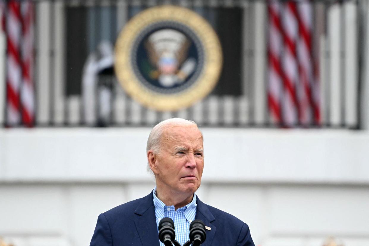 <span>Joe Biden speaks outside the White House on 4 July 2024.</span><span>Photograph: Mandel Ngan/AFP/Getty Images</span>