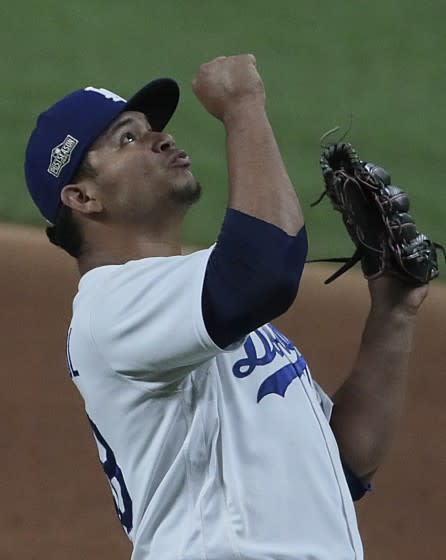 Arlington, Texas, Wednesday, October 7, 2020. Los Angeles Dodgers starting pitcher Brusdar Graterol (48) celebrates after pitching two scoreless innings against the Padres in game two of the NLDS at Globe Life Field. (Robert Gauthier/ Los Angeles Times)