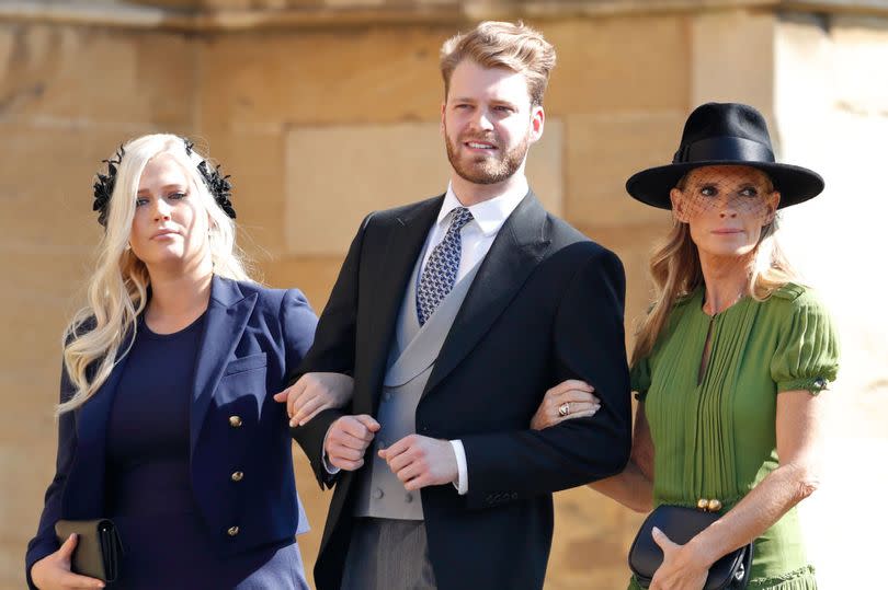 Louis Spencer with his mum Victoria and sister Eliza at Prince Harry's wedding in 2018