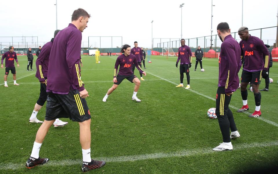 Edinson Cavani (centre) training with Manchester United - GETTY IMAGES