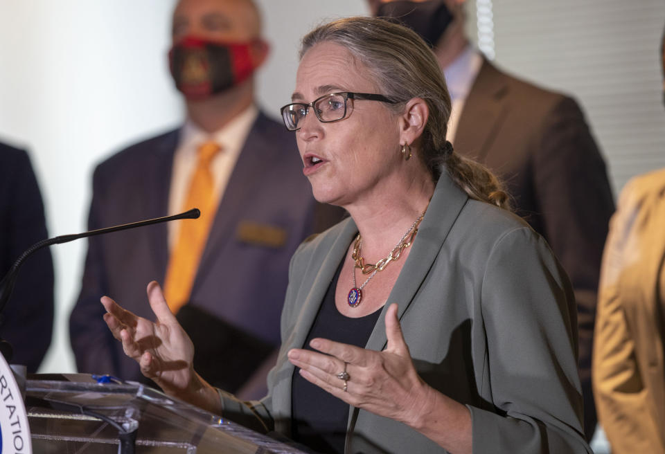 FILE - U.S. Rep. Carolyn Bourdeaux speaks during a news conference in downtown Atlanta on May 21, 2021. Rep. Lucy McBath and Bourdeaux are facing off in the Democratic primary on Tuesday, May 24, 2022, after McBath switched districts following redistricting. (Alyssa Pointer/Atlanta Journal-Constitution via AP, File)