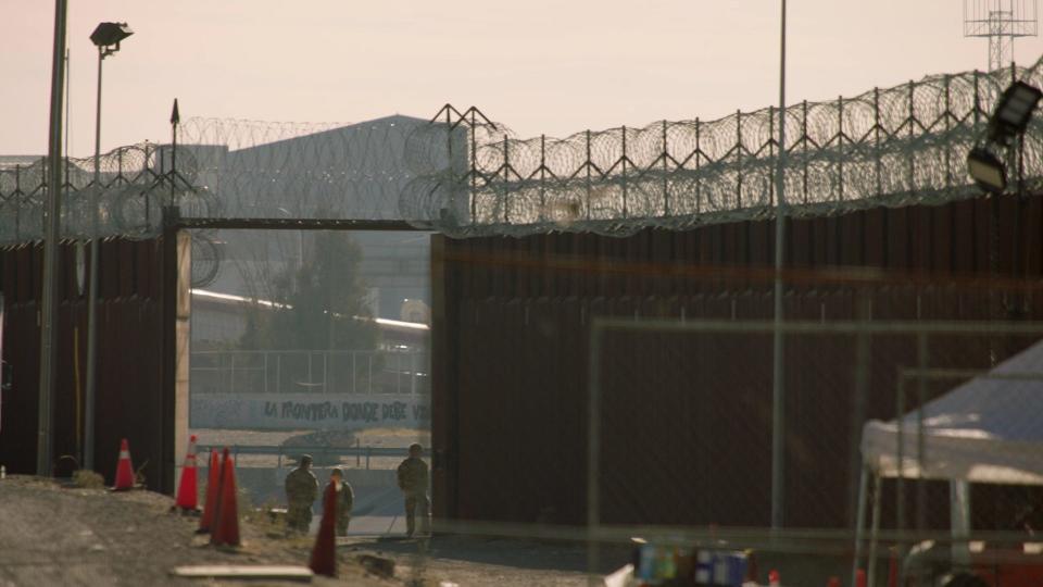 The border wall in El Paso features in a scene from the documentary "God Save Texas-La Frontera" by University of Texas professor Iliana Sosa.