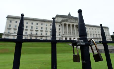 A gate is padlocked in front of Stormont Castle in Belfast, Northern Ireland June 28, 2017. REUTERS/Clodagh Kilcoyne