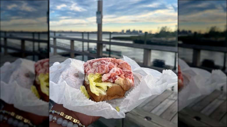 Paper-wrapped lobster roll by the waterfront