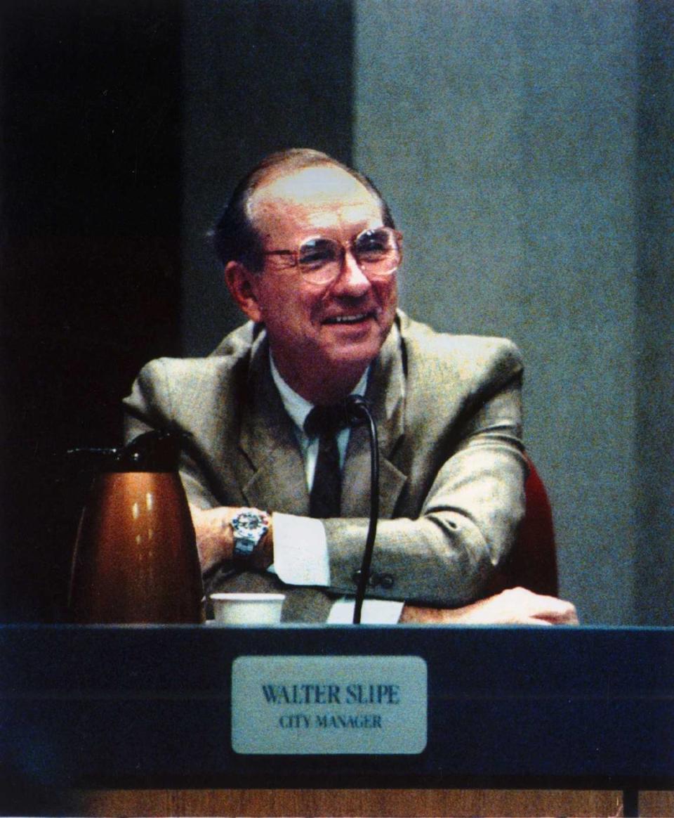 Walter Slipe sits at his post in City Council chambers in an undated photo. The city’s second-longest city manager, who oversaw rapid growth of the capital city between 1976 and 1993, died June 14 at the age of 90.