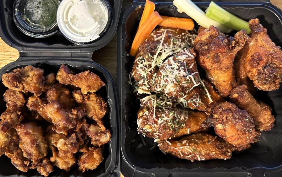 This to-go order from Wing Spot included a starter of fried pork belly, left, with garlic parm and lemon pepper chicken wings.