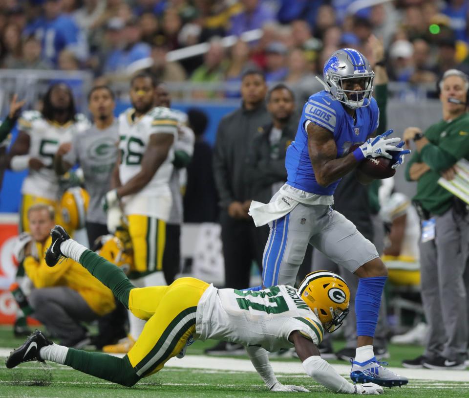 Kenny Golladay makes a catch over Packers safety Josh Jones in 2018.