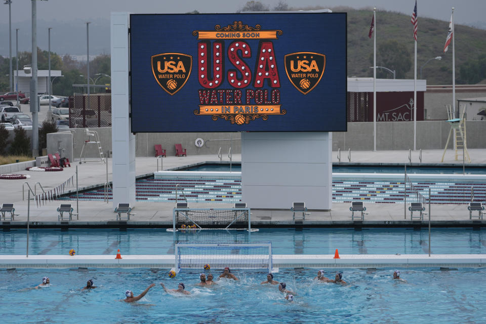 The U.S. Olympic Water Polo Team trains for the Paris Olympics at Mt. San Antonio College in Walnut, Calif., on Wednesday, Jan. 17, 2024. (AP Photo/Damian Dovarganes)