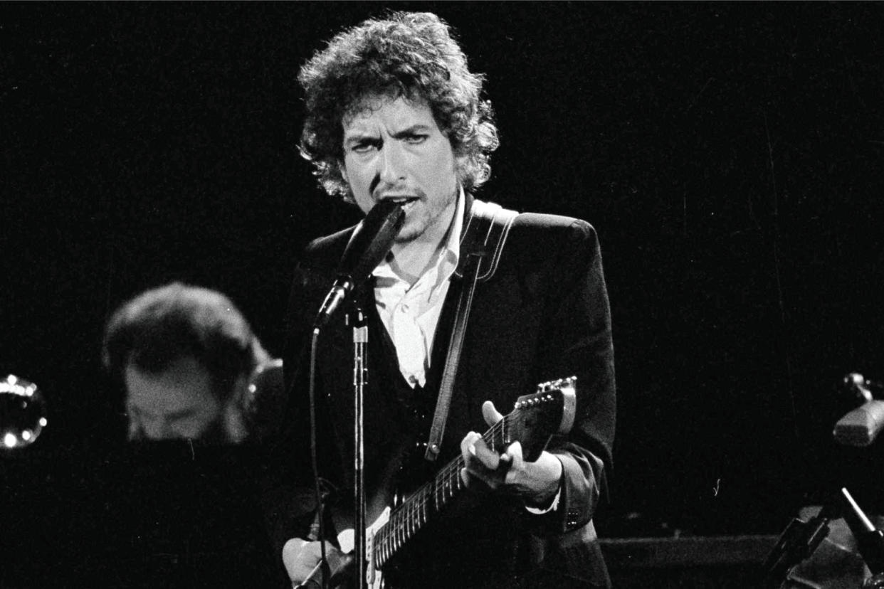 Bob Dylan, Robert Zimmerman, Robbie Robertson, Garth Hudson - Credit: Jeff Robbins/AP