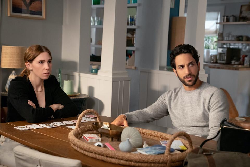 Zosia Mamet (left) and Deniz Akdeniz grapple with the latest wave of chaos in the new season of HBO Max's "The Flight Attendant," premiering with three episodes April 21.