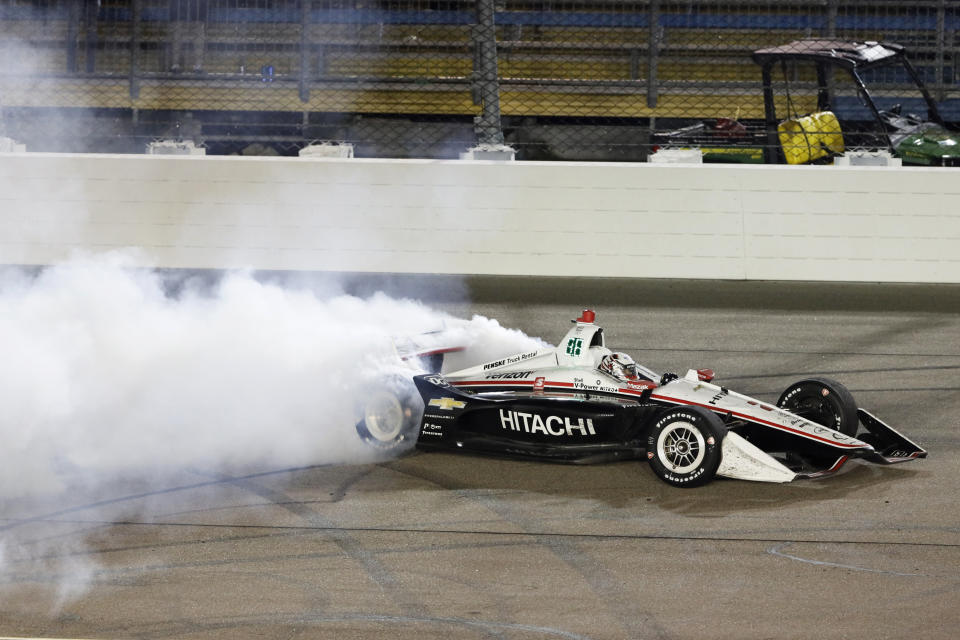 Josef Newgarden does a burnout after winning the IndyCar Series auto race Sunday, July 21, 2019, at Iowa Speedway in Newton, Iowa. (AP Photo/Charlie Neibergall)