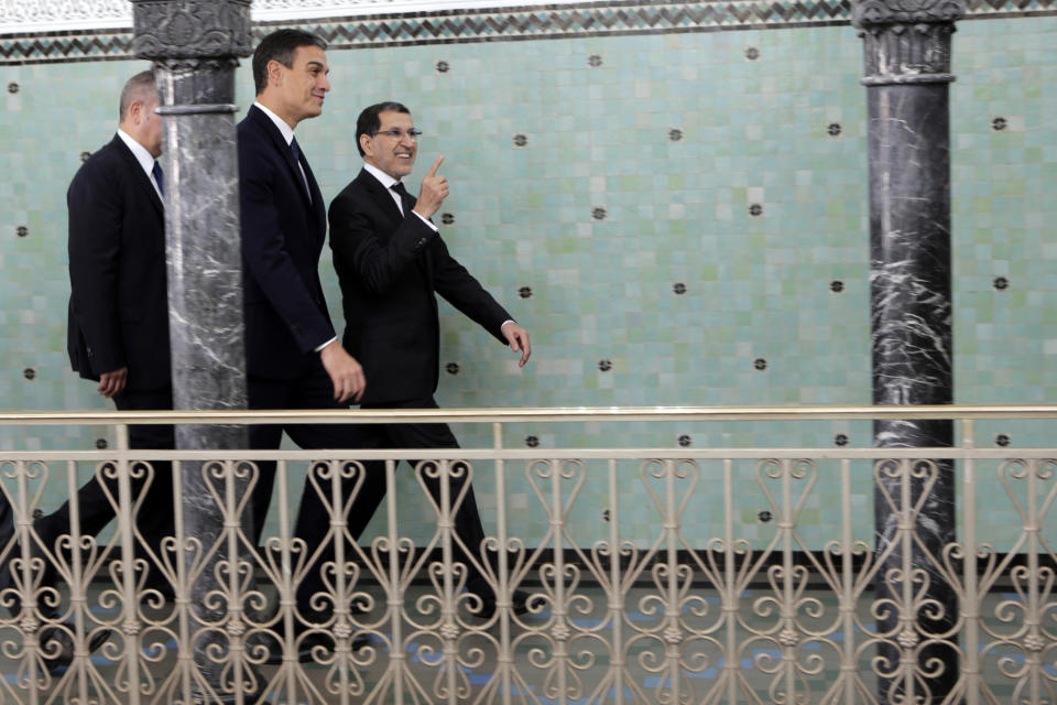 Morocco's Prime Minister Saad Eddine el-Othmani, right, greets his Spanish counterpart Pedro Sanchez prior to their meeting, in Rabat, Morocco, Monday, Nov, 19, 2018. (AP Photo)