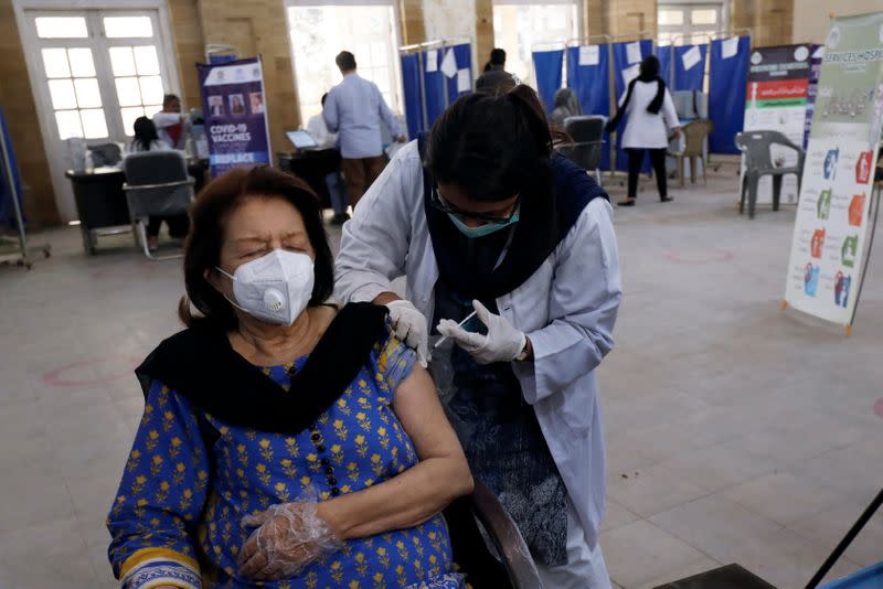 Vaccination against the coronavirus disease (COVID-19) starts with the elderly, in Karachi