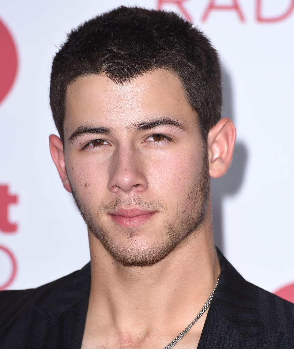 LAS VEGAS, NV - SEPTEMBER 19:  Nick Jonas poses at the 2014 iHeartRadio Music Festival - Night 1 - Press Room at MGM Grand Garden Arena on September 19, 2014 in Las Vegas, Nevada.  (Photo by Steve Granitz/WireImage)