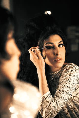 <p>Bryan Adams/Camera Press London</p> Amy applying her makeup