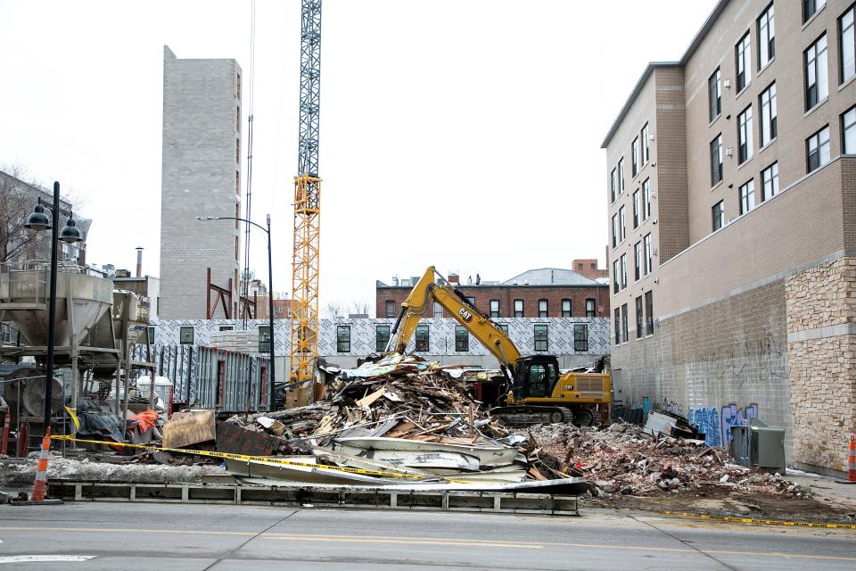 Demolition continues at the former location of The Mill restaurant, Thursday, Jan. 27, 2022, at 120 E. Burlington St. in Iowa City, Iowa.