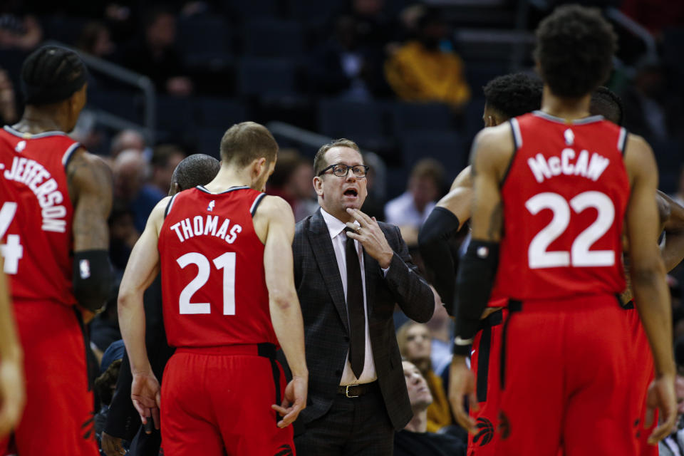 暴龍教練Nick Nurse（穿西裝者）。（AP Photo/Nell Redmond）