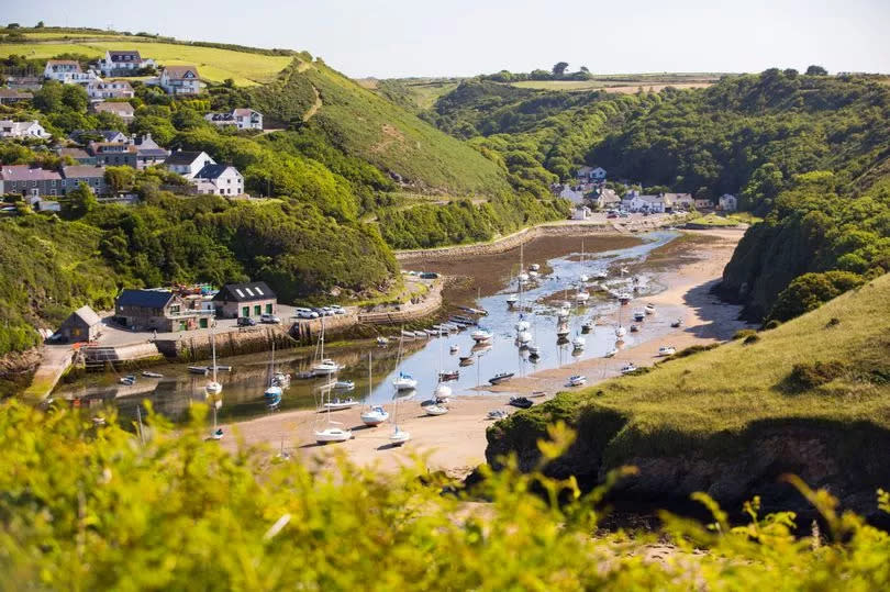 Welsh village nestled among hills.