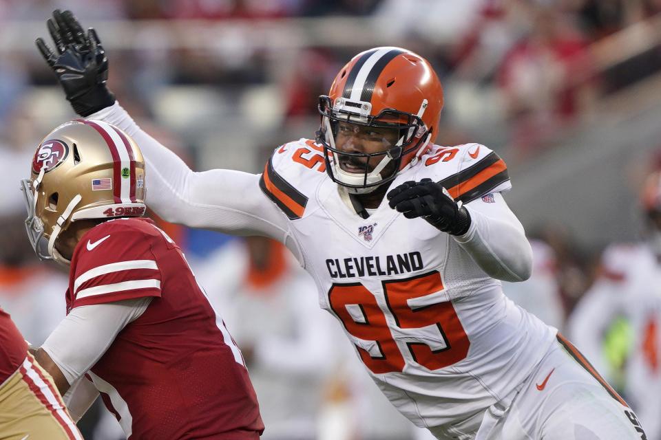 Cleveland Browns defensive end Myles Garrett (95) sacks San Francisco 49ers quarterback Jimmy Garoppolo during the first half of an NFL football game in Santa Clara, Calif., Monday, Oct. 7, 2019.