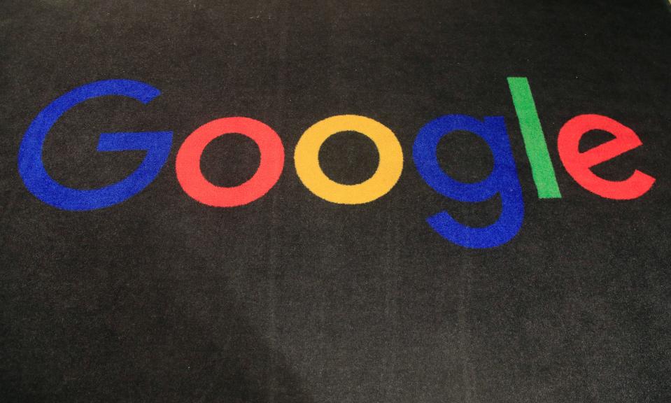 Google logo displayed on a carpet.