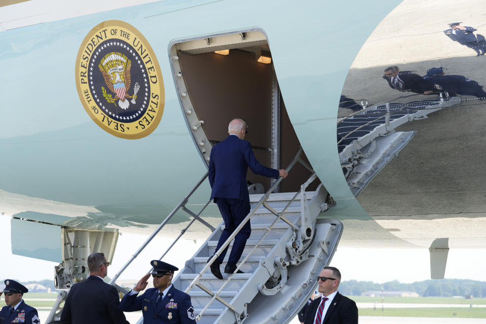 President Joe Biden walks up the steps of Air Force One at Andrews Air Force Base, Md., Friday, July 28, 2023. Biden is heading to Maine for the first time of his presidency, packaging his signing of an executive order with a speech at a textile factory and a fundraiser later in the town of Freeport. (AP Photo/Susan Walsh)