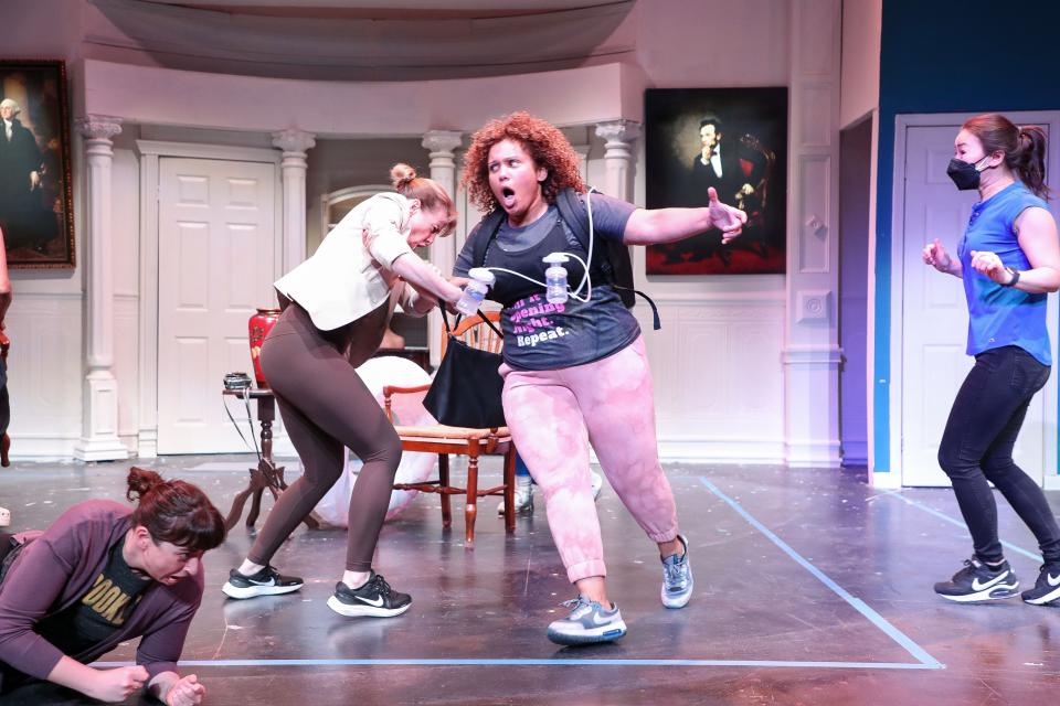 From left, Emily Nash, Julie Cardia, Tamika Katon Donegal and Michelle Liu Coughlin perform during a dress rehearsal of "POTUS: Or Behind Every Great Dumbass Are Seven Women Trying To Keep Him Alive," at the Coachella Valley Repertory in Cathedral City, Calif., Feb. 23, 2024.