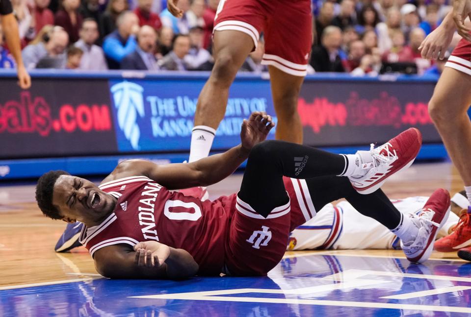 Dec 17, 2022; Lawrence, Kansas, USA; Indiana Hoosiers guard Xavier Johnson (0) reacts after a play during the first half against the Kansas Jayhawks at Allen Fieldhouse.