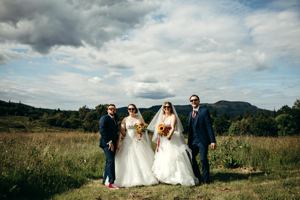 The sisters even purchased their wedding dresses on the same day [Photo: SWNS]  