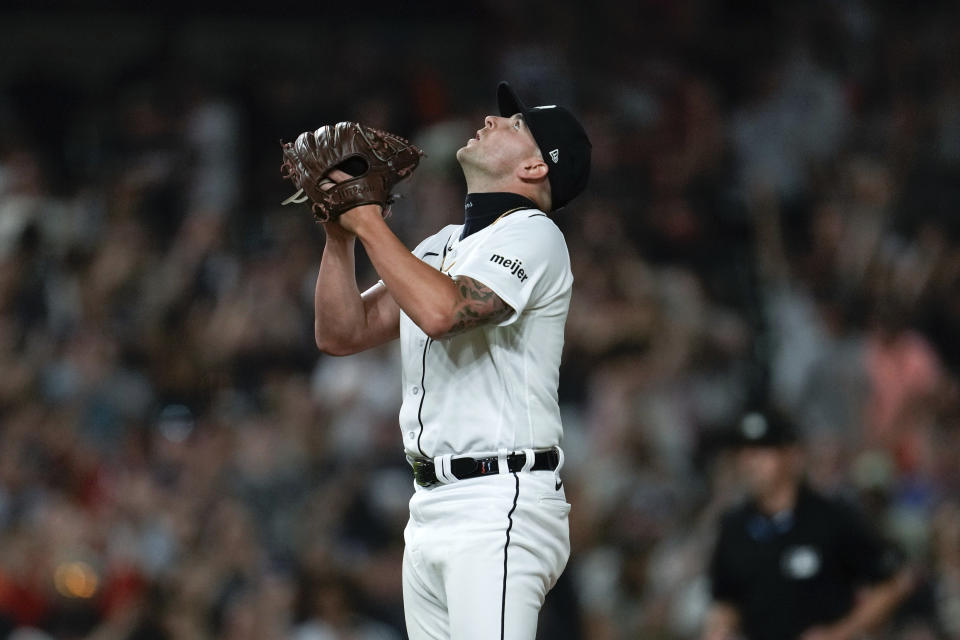 Detroit Tigers relief pitcher Alex Lange reacts after the final out against the Minnesota Twins in the ninth inning of a baseball game, Saturday, June 24, 2023, in Detroit. (AP Photo/Paul Sancya)