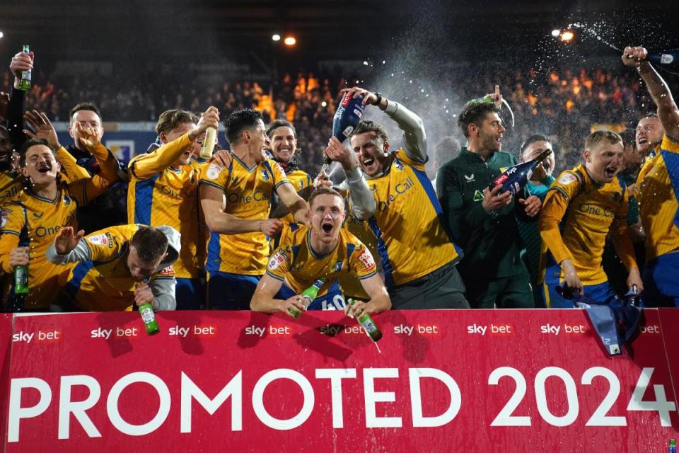 UP: Mansfield celebrate sealing promotion with victory against Accrington <i>(Image: PA)</i>